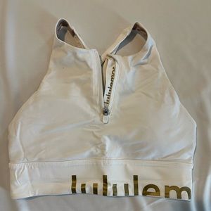 Lululemon white with gold writing sports bra
